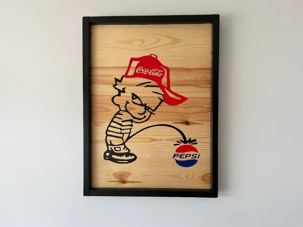 Boy with coca-cola cap peeing on pepsi brand