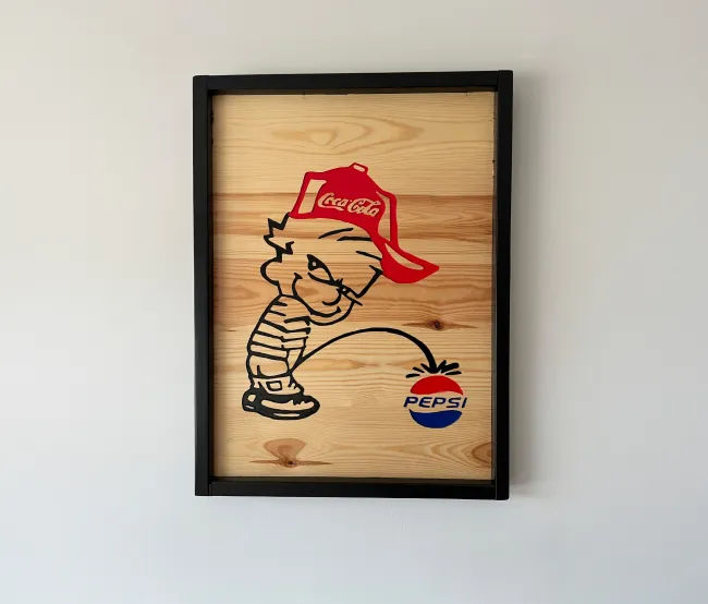Boy with coca-cola cap peeing on pepsi brand